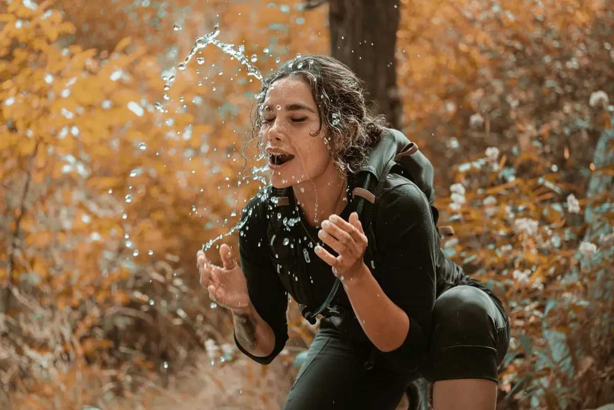 Trail runner catching her breath during a hard effort outdoors