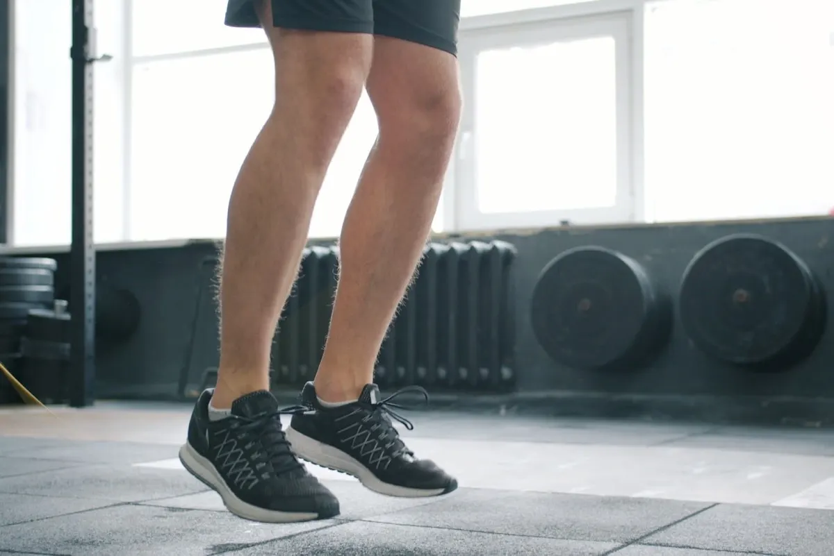 Person doing a high-intensity interval workout in a gym