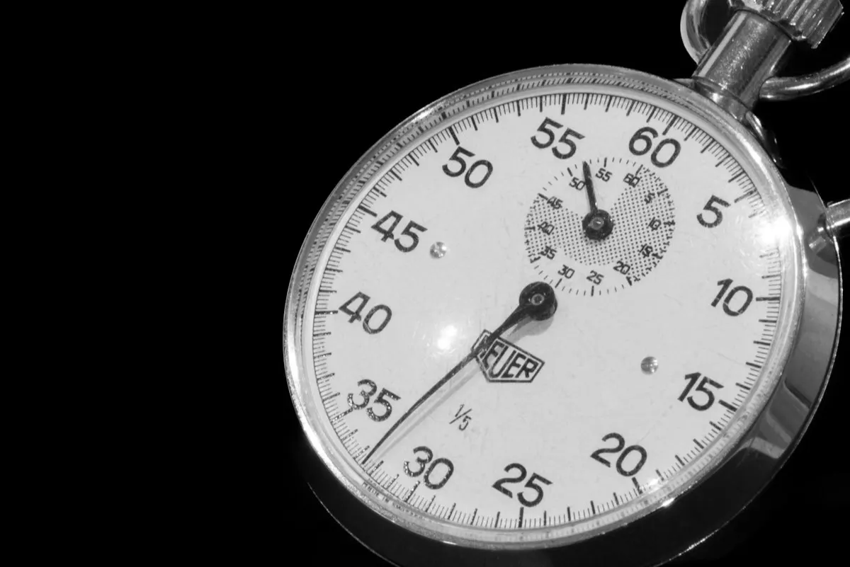 A close-up stopwatch, the classic tool for timing workout intervals